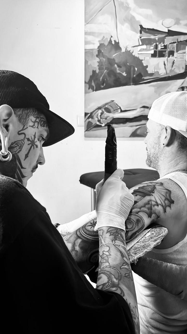 Tattoo session in progress